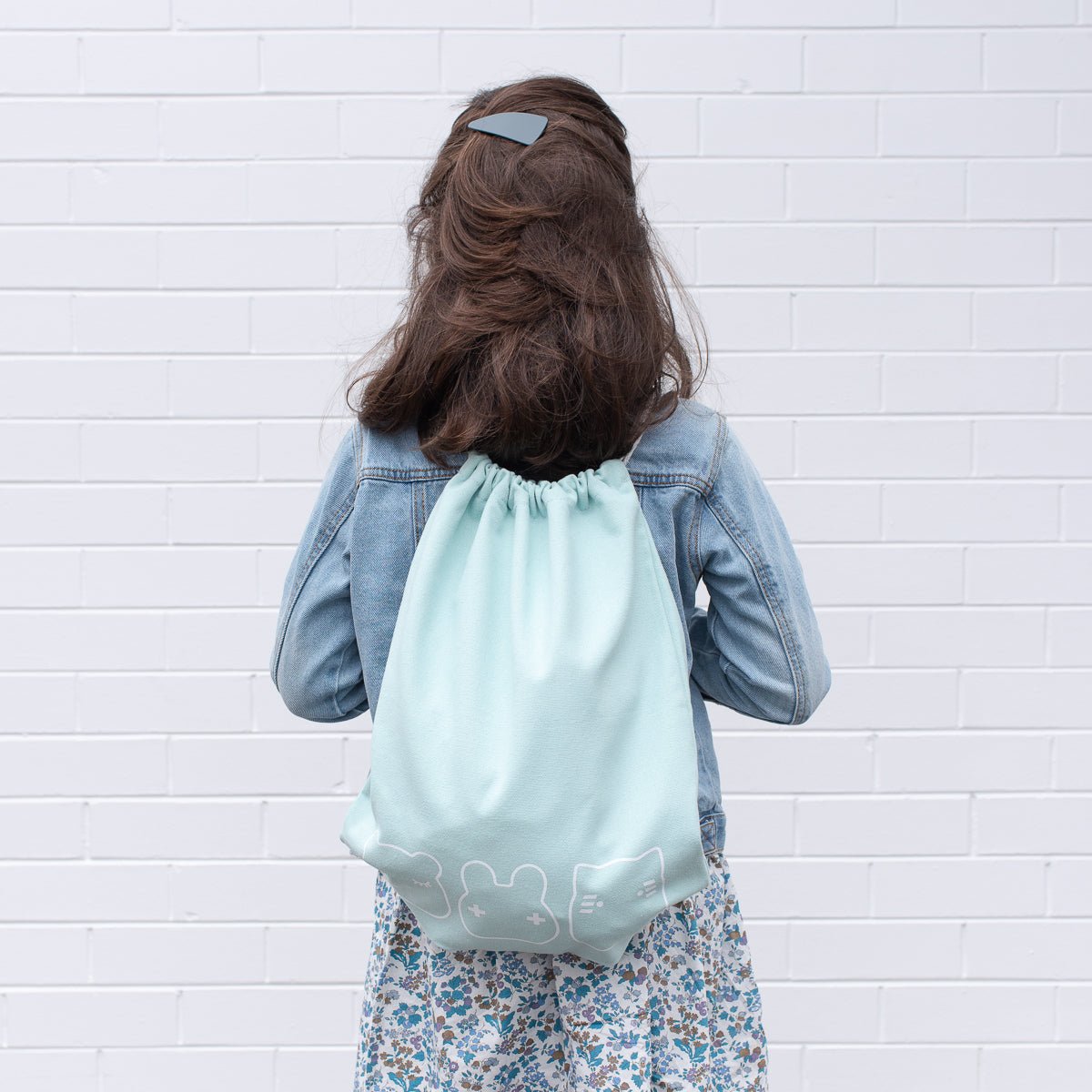 we-might-be-tiny-drawstring-canvas-bag-sage