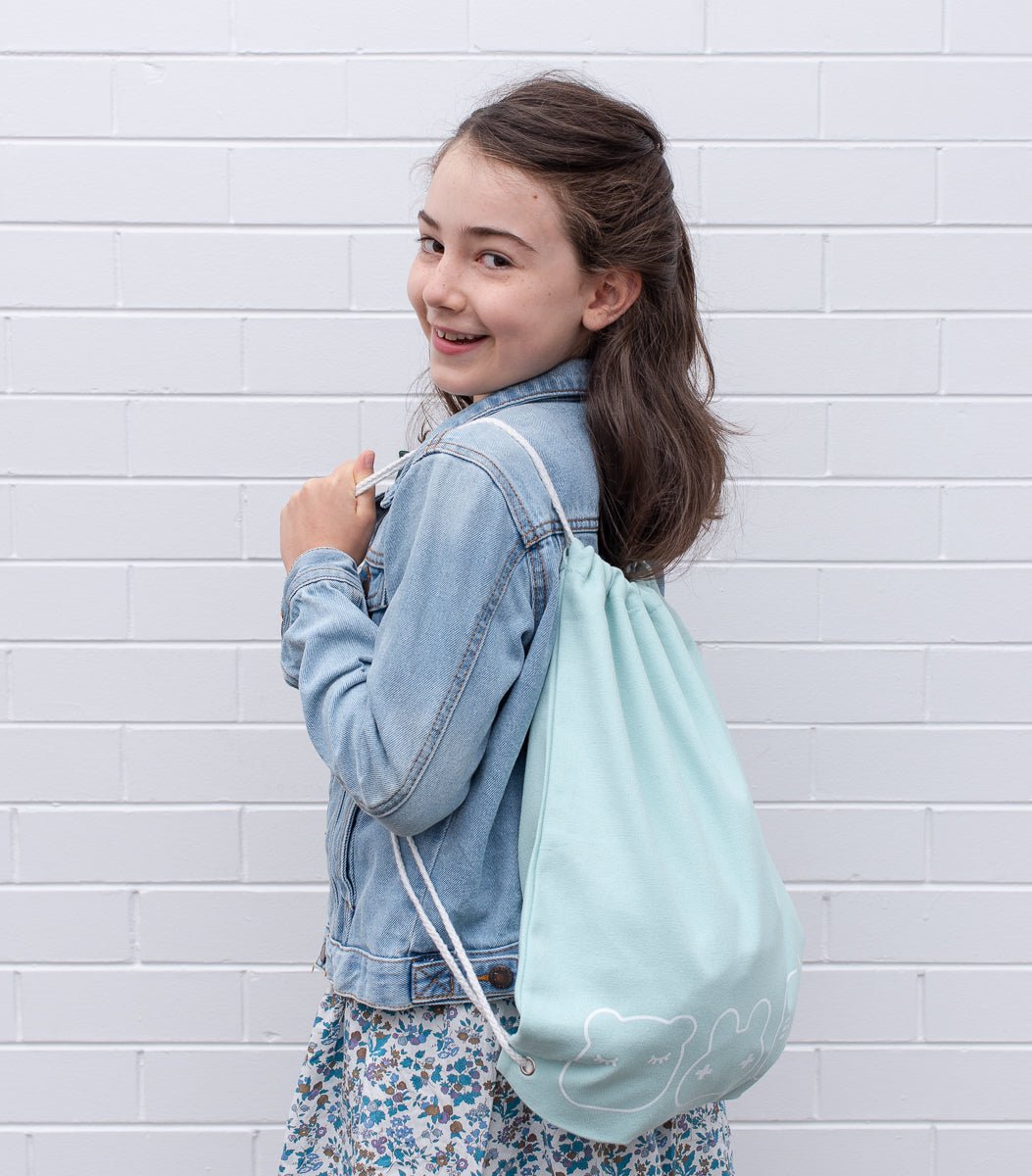 we-might-be-tiny-drawstring-canvas-bag-sage